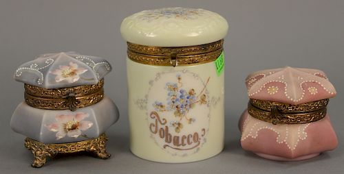 Three piece lot including Wavecrest tobacco covered jar and two jewel boxes, one signed Nakara. ht. 3 in., 3 1/2 in., & 5 in.
