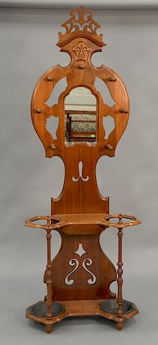 Walnut Victorian coat rack with mirror. ht. 89 in., wd. 32 in.