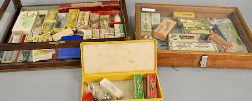 Two display cases with vintage lures with original boxes. ht. 3 in., wd. 19 in. and ht. 6 in., wd. 21 in.