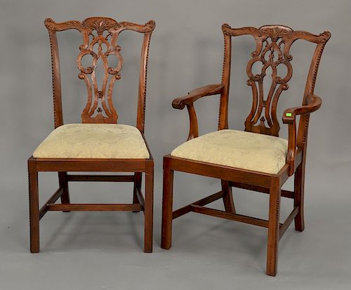 Set of ten mahogany Chippendale style chairs, two with arms.