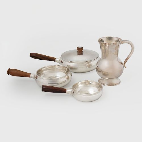 Three Puiforcat Silver Sauce Pans and a Water Pitcher
