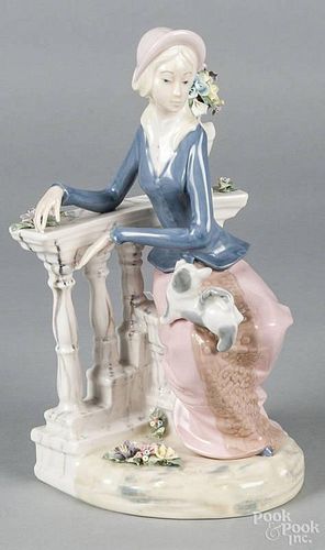 Aledifor porcelain figure of a seated woman, 12 1/2'' h.