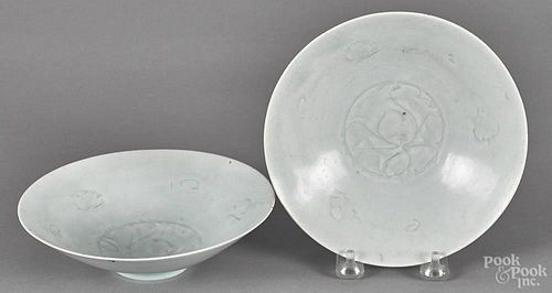 Pair of Chinese carved celadon bowls, 1 7/8'' h., 6 7/8'' dia.