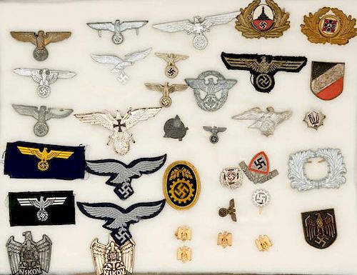 German WWII Eagles Insignia, Lot of Thirty-Five 
