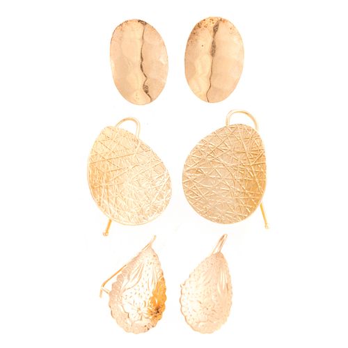 A Trio of Textured Earrings in Gold
