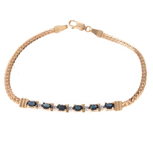 A Lady's Sapphire & Diamond Bracelet in 14K Gold