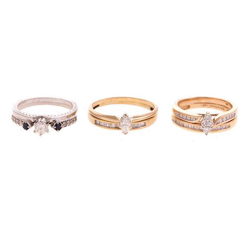 A Trio of Diamond Engagement Rings & Bands