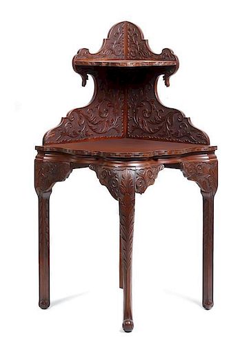 A Carved Corner Stand, Height 58 7/8 x width 36 3/8 x depth 33 1/2 inches.