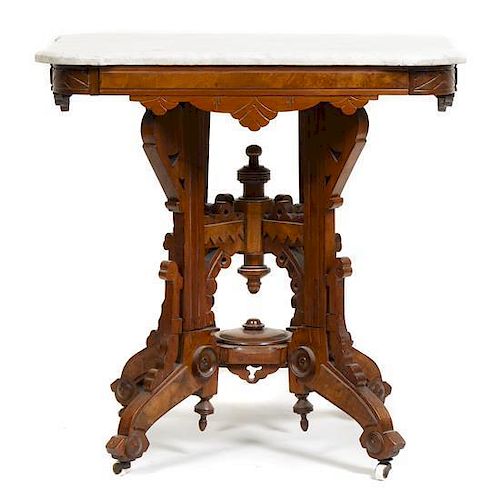 An Eastlake Occasional Table, Height 28 5/8 x width 28 3/8 x depth 20 1/2 inches.