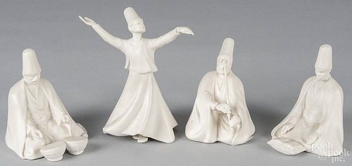Four Turkish Yildiz porcelain figures, to include men reading, playing music