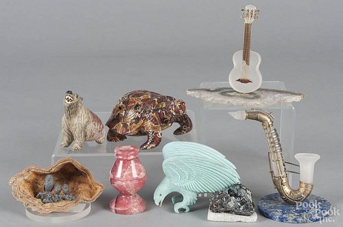 Group of decorative stone items, to include a carved tortoise, a carved and painted polar bear