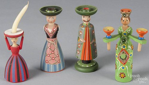 Four Swedish hand-painted wooden doll candle holders, tallest - 7 1/4''.