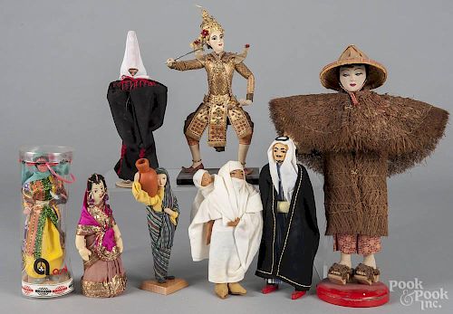 Group of assorted antique Asian dolls, to include four Middle Eastern examples, an Indian woman
