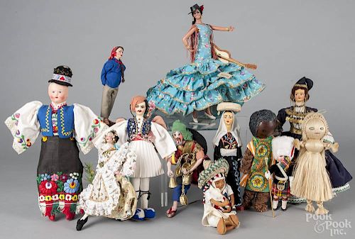Nine assorted antique European dolls, together with two African straw dolls