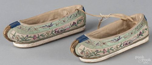Pair of Chinese silkwork slippers, 19th c., 8'' l.