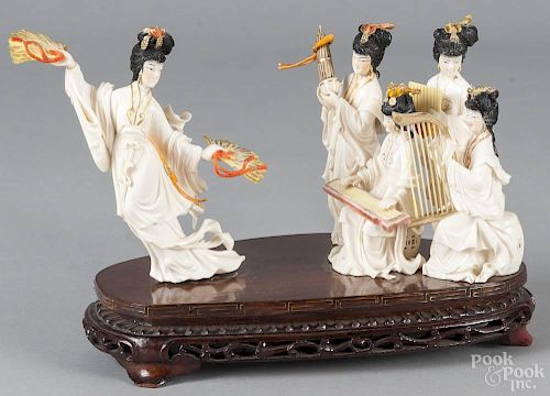 Chinese carved and painted ivory figural group, 19th c., of ladies dancing