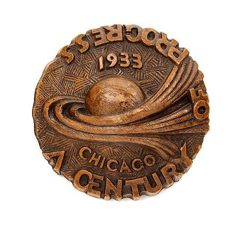 A Century of Progress Cast Resin Paperweight Diameter 3 1/2 inches.