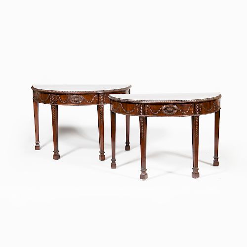 Pair of George III Style Carved Mahogany D-Shaped Consoles