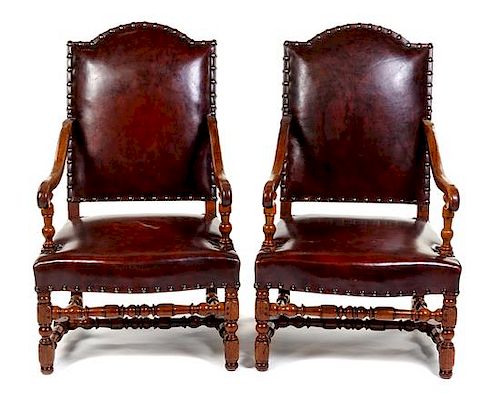 A Pair of Louis XIII Style Walnut Fauteuils Height 43 inches.