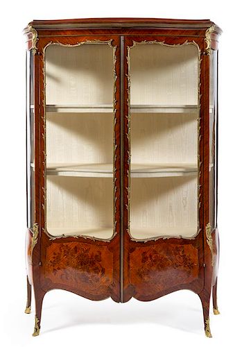 A Louis XV Style Gilt Bronze Mounted Marquetry Vitrine Height 70 5/8 x width 47 x depth 15 1/2 inches.