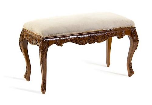 A Louis XV Style Carved Bench Height 20 1/2 x width 35 x depth 16 1/8 inches.
