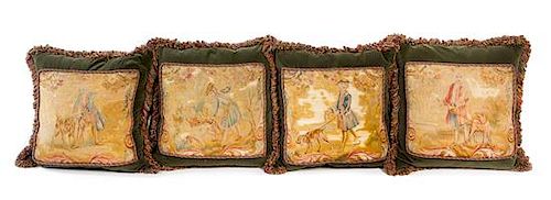 A Set of Four French Aubusson Tapestry-Inset Pillows Height 21 1/2 x width 21 1/2 inches.