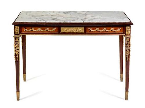 A Louis XVI Style Gilt Bronze Mounted Center Table Height 30 1/2 x width 45 x depth 27 1/4 inches.
