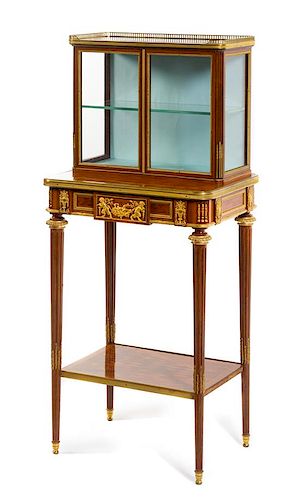 A Louis XVI Style Gilt Bronze Mounted Parquetry Vitrine Cabinet Height 46 3/4 x width 20 3/4 x depth 15 inches.