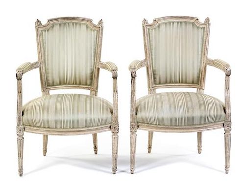 A Pair of Louis XVI Painted Fauteuils Height 34 inches.