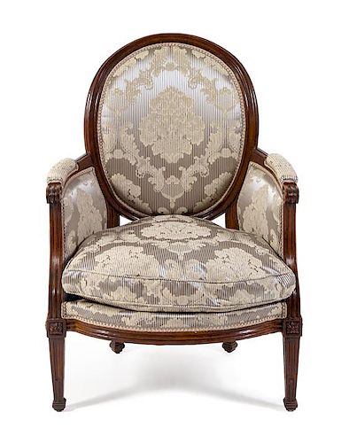 A Northern Italian Walnut Bergere Height 38 1/8 inches.