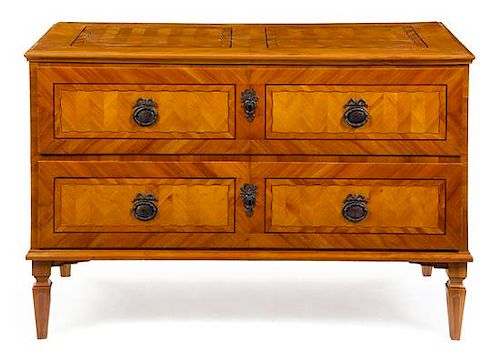 An Italian Parquetry Commode Height 33 1/4 x width 51 x depth 25 1/4 inches.