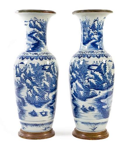 A Pair of Chinese Bronze Mounted Blue and White Porcelain Floor Vases Height 39 3/4 inches.