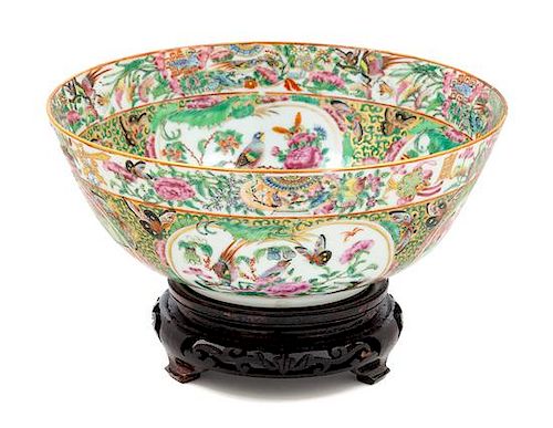 A Rose Medallion Porcelain Punch Bowl Height 3 3/4 x diameter 9 3/8 inches.