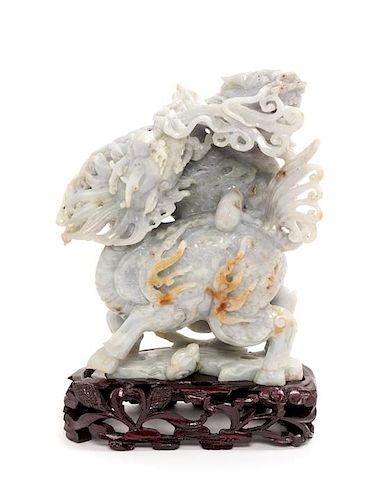 A Chinese Carved Jadeite Figural Group Height 6 3/8 inches.