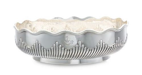 A George IV Silver Center Bowl, Likely Thomas Baker, London, 1822, of oval form with an undulating rim, the reeded undulating bo