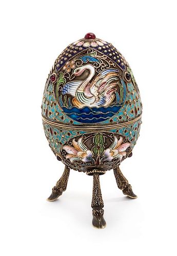 A Russian Enameled Silver Egg Form Box, Mark of Nikolai Zugeryev, Moscow, First Quarter 20th Century, the lid worked to show pol