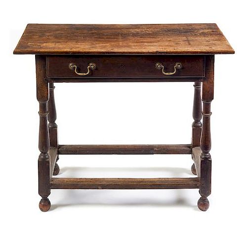 A William and Mary Style Oak Table Height 28 1/4 x width 34 3/4 x depth 17 1/4 inches.