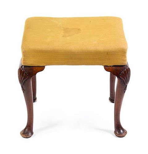 A Queen Anne Style Mahogany Stool Height 17 x width 18 1/2 x depth 14 inches.