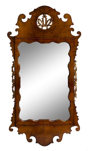 A George III Style Parcel Gilt Mahogany Mirror Height 37 1/2 x width 19 1/4 inches.