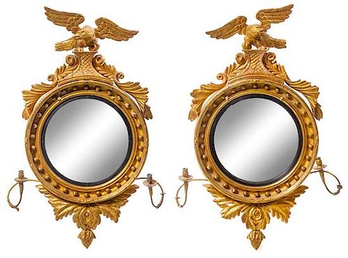 A Pair of Giltwood Girandole Mirrors Height 43 x width 27 inches.