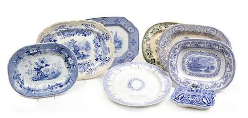 A Collection of Eight Staffordshire Platters Width of first 19 inches.