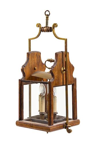 An English Brass and Mahogany Ship's Lantern Height 27 inches.