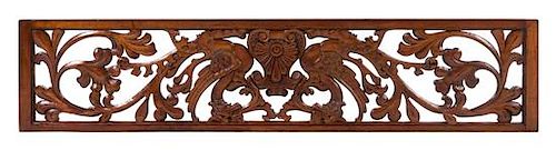 A Carved Maple and Walnut Transom Plate Height 16 x width 74 inches.