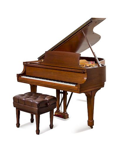 * A Steinway & Sons Walnut Living Room Grand (Model L) Piano Length of case 70 1/2 inches.