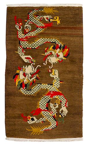 A Tibetan Wool Rug 5 feet 5 inches x 3 feet 1 inch.