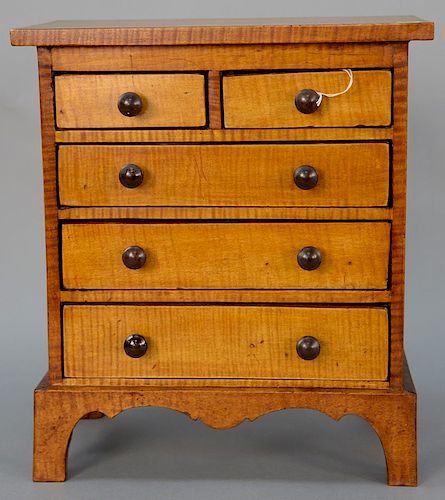Diminutive tiger maple chest, two over three drawers.  height 16 in., top: 7" x 14"