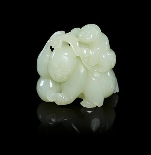A Carved Jade Toggle Height 2 inches.