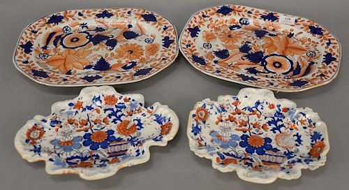 Four piece lot to include two blue and orange platters, two are shaped, 19th century.  platters: 11 1/4" x 14 1/4" & 9" x 12"