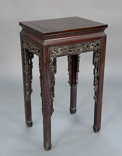Chinese hardwood stand with pierce carving.  height 23 1/4 in., top: 15 1/4" x 18 3/4"  Provenance: Estate of Eileen Slocum loca...