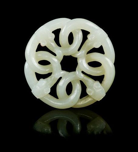 * A Carved Jade Toggle of Chilong Width 2 1/4 inches.